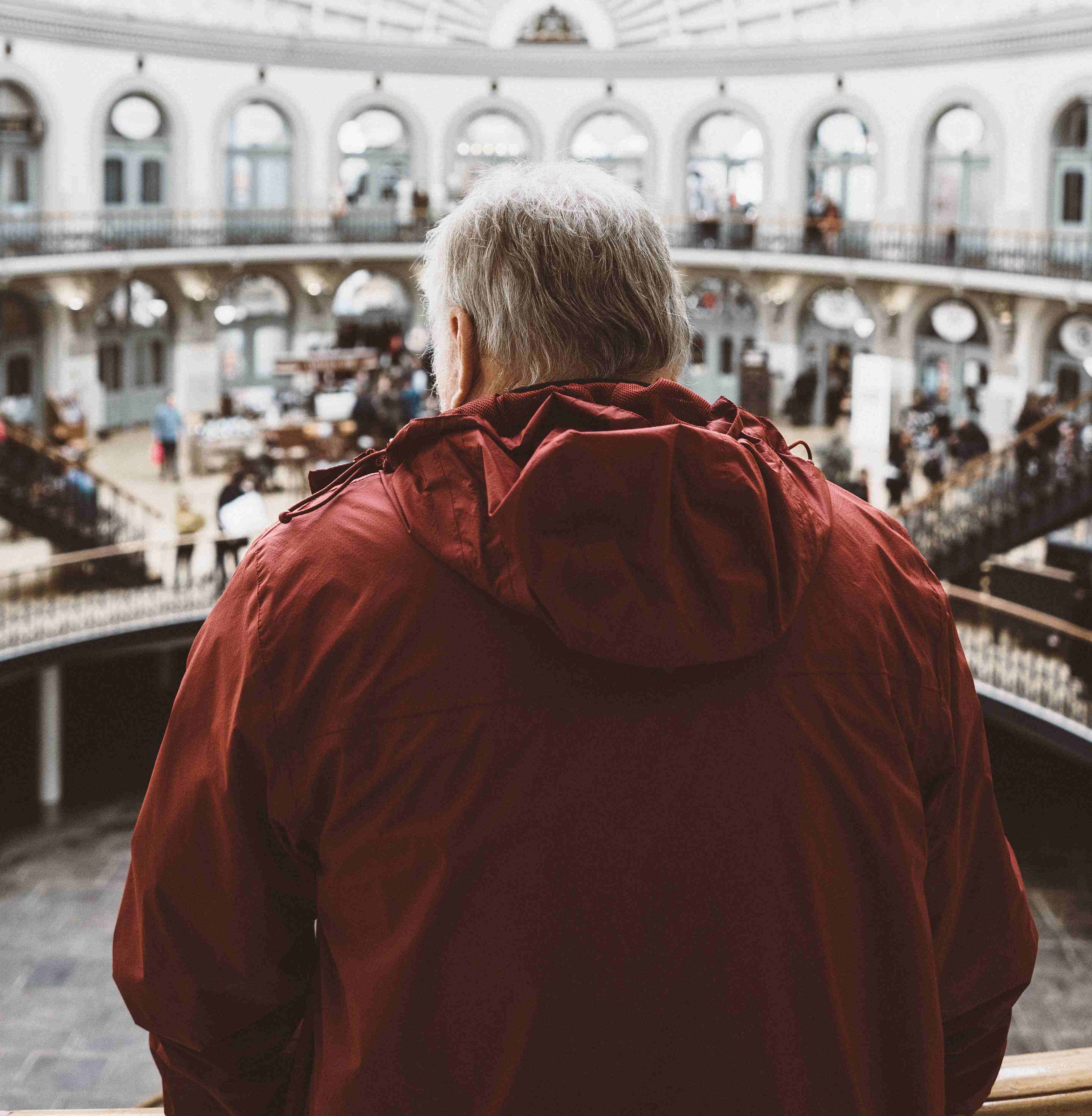 Image of person looking down towards an exhibition